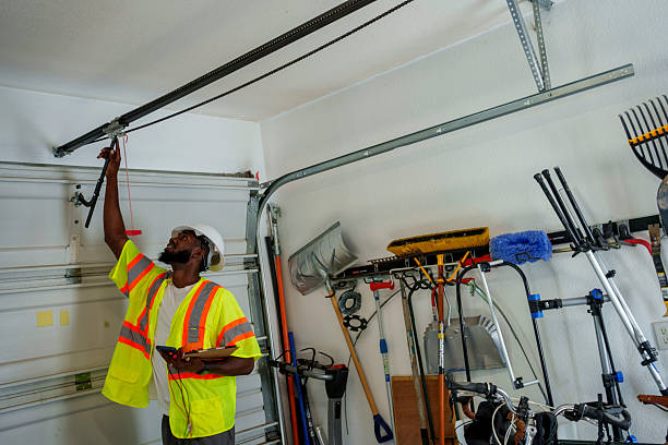Professional Garage Door Panel Replacement technician working in Andalusia, IL